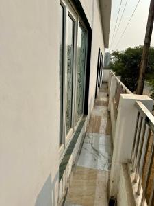 a window on the side of a building at Anmol Hotel And Restaurant in Chandausi