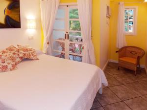 Cama ou camas em um quarto em Pousada Casablanca