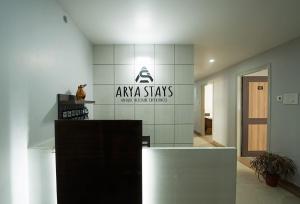 aania stars sign on a wall in a room at Happy Villa Guest House in Guwahati