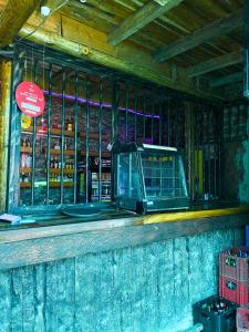 a bar with a computer on top of it at Royal Lake View Gardens in Kampala