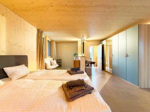 Stadtloft Vianne mit Terrasseにあるベッド