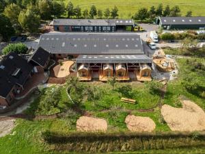 an aerial view of a large house with a yard at De Buitenkamer in Rijssen