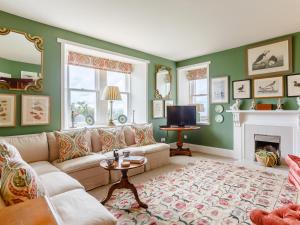 a living room with a couch and a fireplace at 3 Bed in Thurso oc-ca337 in Mey