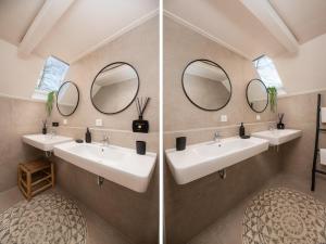two sinks in a bathroom with two mirrors at De Vuursteen | 10 - 40 pers. in Losser +41 photos