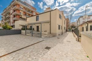 an empty parking lot in front of a building at Villa Decimum in Ciampino