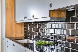 a kitchen with a sink and a counter top at Villa house in Son Old Town - Oslo Fjord in Vestby