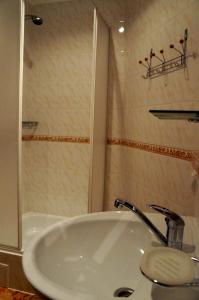 Koupelna v ubytování Usadba Okhotnichiy Dvor