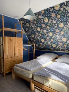 Llit o llits en una habitació de Finnhaus Hanni