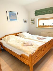 Llit o llits en una habitació de Boddenhaus 60