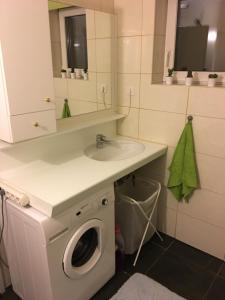 Koupelna v ubytování city apartment + 8 fotografií