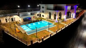 an overhead view of a swimming pool in front of a house at Gelevera Park - Otel Spa Restaurant in Espiye +17 photos