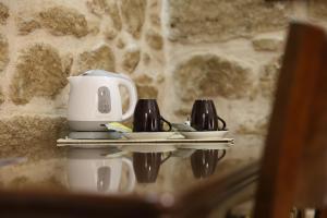 Příslušenství pro přípravu čaje a kávy v ubytování Bienestar - Maison de Charme