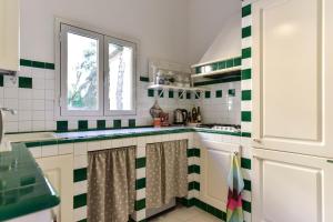 Kuchyňa alebo kuchynka v ubytovaní Maru Apartment