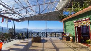 a view from the top of a building with mountains at Great Eastern Valley Residency in Gangtok