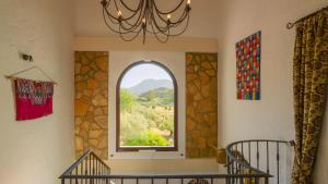 a room with a window with a view at Casa Olea in Priego de Córdoba