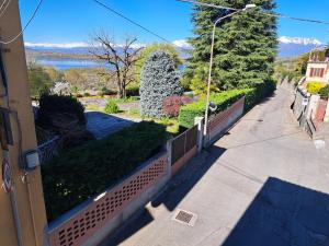 a balcony of a house with a view of a garden at Casa Vacanza ANNA in Viverone