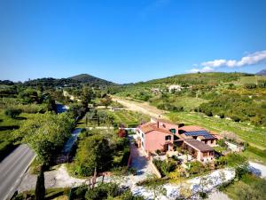 an aerial view of a house next to a river at Bed & Bike Casa dei Papi in Portoferraio