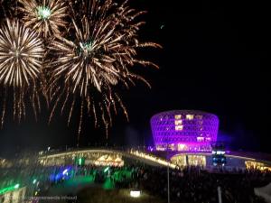 a firework display in front of a building with fireworks at MelCview in Westende-Bad
