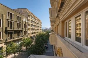 a view of an alley between two buildings at Alexandar Square Boutique Hotel in Skopje