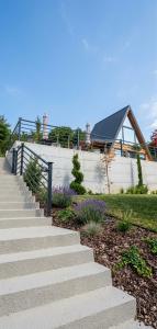 a set of stairs in front of a house at Panorama Pool Hills in Ledinci