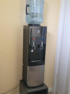 a blender sitting on top of a coffee maker at Twin Pines Studios in Jacksonville