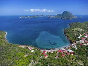 an aerial view of a beach and the ocean at LA DILETTANTE - Maison Créole de 130m2 - Clim - Tout à Pied in Terre-de-Bas +15 photos