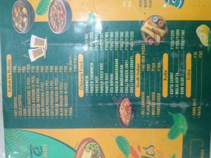 a book with a picture of food on the cover at Shree krishna guest House near Ram mandir in Ayodhya
