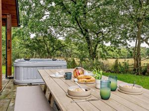 a wooden table with food on top of it at 2 Bed in Swansea oc-91726 in Killay
