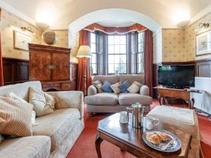 a living room with a couch and a table at 5 Bed in Blairgowrie oc-ca409 in Cray