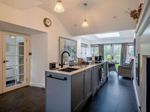 a kitchen with a sink and a counter top at 2 Bed in Ulverston oc-94926 in Lakeside +12 photos