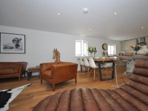 a living room with a couch and a table at 3 Bed in Tetbury oc-44955 in Tetbury