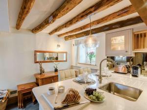 a kitchen with a sink and a counter top at 1 Bed in Grange-over-sands oc-89364 in Cartmel
