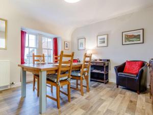 a dining room with a table and chairs at 2 Bed in Anstruther oc-ca006 in Crail