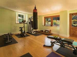 a gym with exercise equipment and a television in a room at 1 Bed in Coniston oc-lcc37 in High Nibthwaite