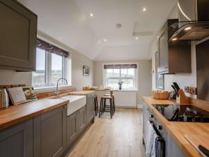 a kitchen with a sink and a counter top at 2 Bed in Duns oc-82759 in Duns