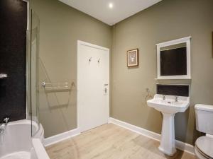 a bathroom with a shower and a sink and a toilet at 2 Bed in Duns oc-82759 in Duns +12 photos