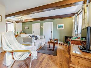 a living room with a couch and a tv at 2 Bed in Barnard Castle oc-90498 in Middleton in Teesdale
