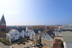 an aerial view of a city with houses at Rüter 57 w in Westerland