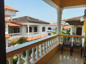 a view from the balcony of a house at The Coastal Villa Arpora in Parra