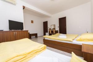 Posteľ alebo postele v izbe v ubytovaní Villa Katarina