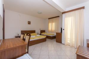 Posteľ alebo postele v izbe v ubytovaní Villa Katarina