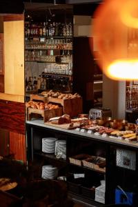 a buffet line with many different types of food at HotelO Kathedral in Antwerp