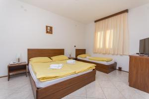 Posteľ alebo postele v izbe v ubytovaní Villa Katarina