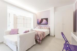 Postel nebo postele na pokoji v ubytování Mondello Suites FLH - Gorgonia