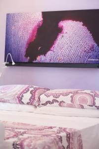 TV a/nebo společenská místnost v ubytování Mondello Suites FLH - Gorgonia