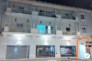 a large white building with balconies on top of it at comodo alojamiento centro Histotico cartagena - 3 in Cartagena de Indias