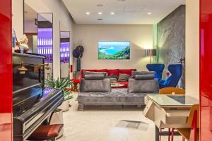 a living room with a couch and a table at Hotel White in Rome