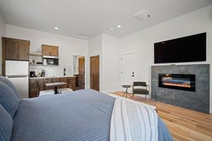 a bedroom with a bed and a fireplace at 18171-2 Forestbrook Loop in Bend +20 photos