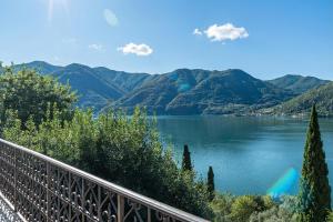 a view of a lake with mountains in the background at Il Tentione in Valsolda