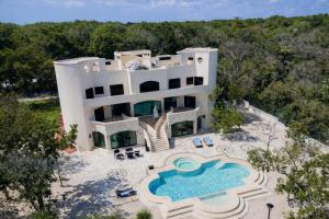 an aerial view of a house with a swimming pool at CISNE Luxury House in Xetna